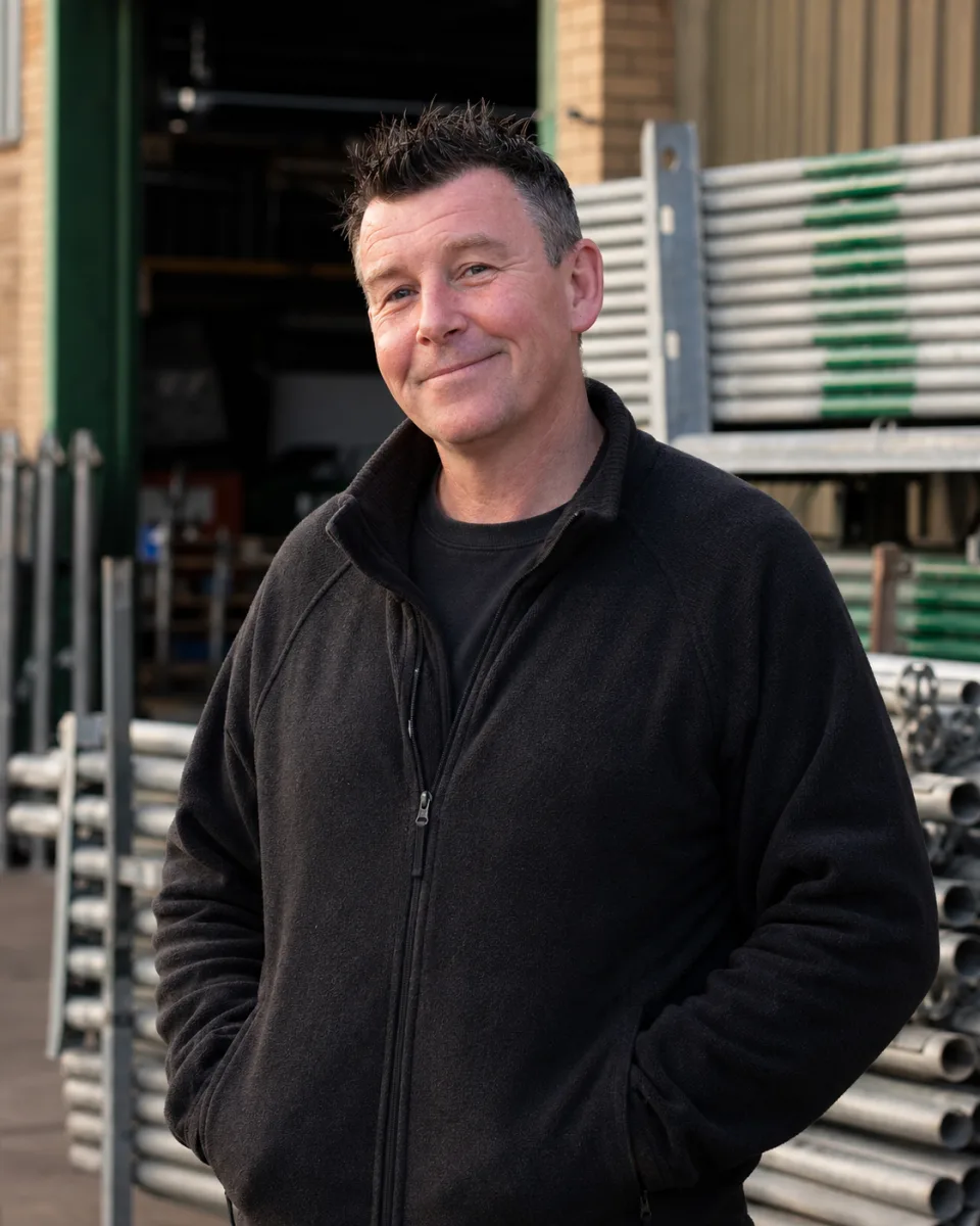 Paul Mitchell in a scaffolding yard
